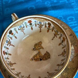 Antique Japanese satsuma ceramic painted tea cup and holding dish